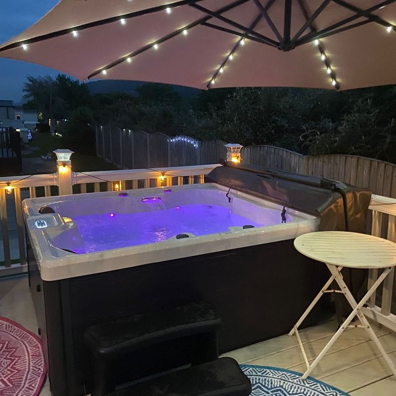 H2O Tubs 13A Plug and Play Pure Bliss Hot Tub Customer Evening Photo With Lights